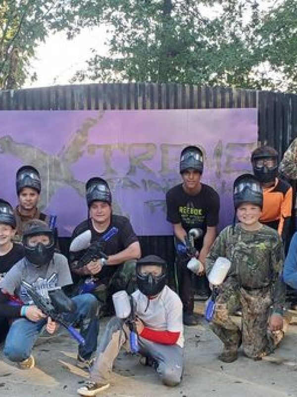 group photo of young boys at paintball park